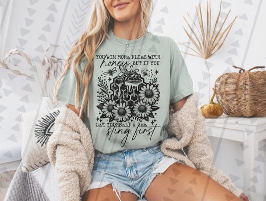 You win more flies with honey